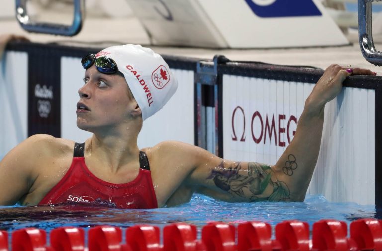 caldwell-rio-reaction-look-at-scoreboard-canada-200-backstroke-tattoo.jpg