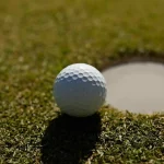golf-ball-on-edge-of-hole.webp.webp