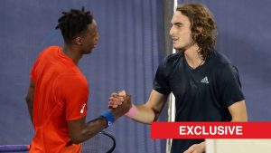 stefanos-tsitsipas-and-gael-monfils-shake-hands-exclusive-logo-bottom-right-1792761907218.jpg
